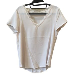 Amazon Essential cream colored short sleeve blouse.